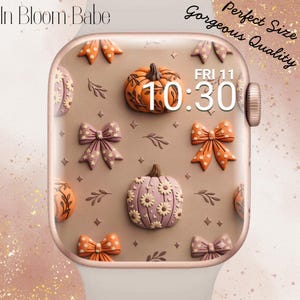 May include: A rose gold smartwatch with a digital display showing the time 10:30 and date FRI 11. The screen features a pattern of orange and mauve pumpkins, bows, and small leaves. Text on the image reads In Bloom Babe, Perfect Size, Gorgeous Quality.