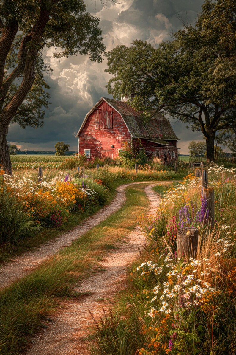 May include: A weathered red barn sits at the end of a dirt path lined with vibrant wildflowers and tall grasses. Large green trees frame the scene under a dramatic, cloudy sky, with a field visible in the distance behind the wooden structure.