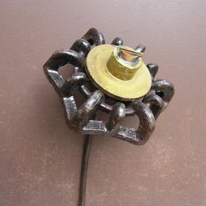 May include: A set of three ceramic mugs with a speckled, matte finish. The mugs are in shades of cream, light gray, and dark gray. Each mug has a simple, minimalist design, perfect for coffee or tea.