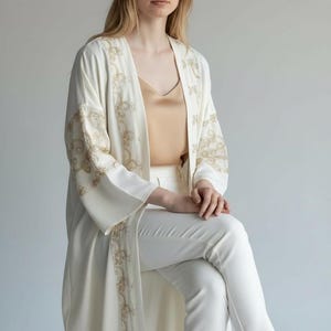 Elegance Off white & Gold Embroidered Abaya
