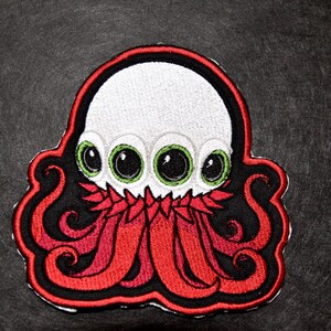 T-Ocellus patch Alien Earth Embroidered Patch: Four-Eyed Tentacle Monster