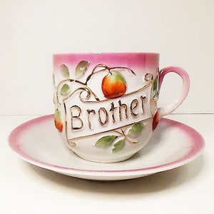 Antique German Porcelain Cup and Saucer: Pink Floral, &quot;Brother&quot; in Gold