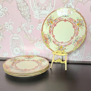 Juego de cuatro platos llanos, Rosenthal Marquise Ivory, porcelana bávara de la década de 1920.