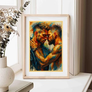 May include: A framed art print depicting an abstract painting of two men in an embrace. The artwork uses a vibrant palette of blues, oranges, and yellows. The men are shown close together, suggesting intimacy. The frame is a light wood colour.
