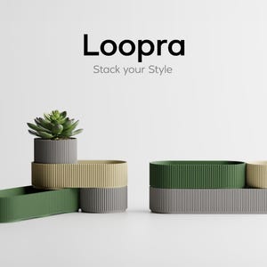 May include: The image showcases a modern, stackable planter set in shades of green, gray, and beige. The planters have a ribbed texture and are arranged in various configurations, some holding a small succulent. The text "Loopra Stack your Style" is displayed.
