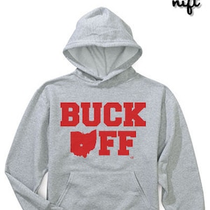 May include: Gray hooded sweatshirt with the words "BUCK OFF" in red letters and an outline of the state of Ohio in red.