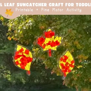 May include: Three colorful leaf-shaped suncatchers with red and yellow tissue paper filling. The leaves are outlined in black and set against a blurred green background of trees. Text at the top reads "Fall Leaf Suncatcher Craft for Toddlers".