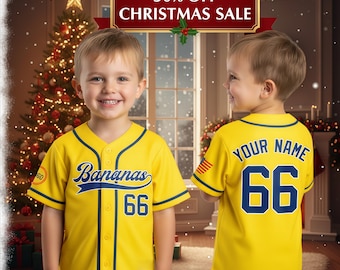 May include: A yellow baseball jersey with navy blue accents and the word "Bananas" in script. The number "66" is displayed on the front and back. The jersey has a button-up front and short sleeves. The text "50% OFF CHRISTMAS SALE" is at the top.
