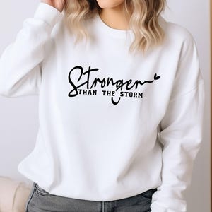 Stronger Than The Storm Sweatshirt: Inspirational Women&#39;s Motivation
