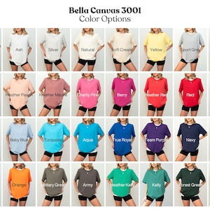 The image is a collage of 24 different color options for a t-shirt, each represented by a woman wearing a different colored shirt.