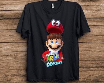 Camiseta unisex con el logo del juego Super Mario Odyssey y Cappy Mario. Camiseta para adultos, camiseta para niños, regalo de cumpleaños, sudadera con capucha, camiseta para niños pequeños.