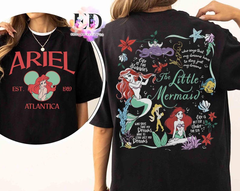 May include: A black t-shirt featuring a front graphic with the text ARIEL EST. 1989 ATLANTICA and an illustration of Ariel. The back graphic displays The Little Mermaid, Ariel, Flounder, and text including Life is the Bubbles and Life is Better Under the Sea.