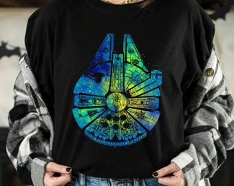 Camiseta con estampado de salpicaduras de tinta de acuarela del Halcón Milenario de Star Wars, camiseta unisex navideña de Galaxy's Edge, regalo de cumpleaños familiar para adultos, niños y bebés.
