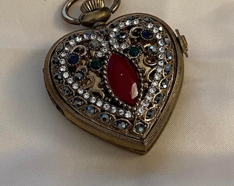 Vintage Sarah Coventry heart-shaped watch pendant