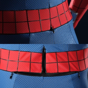 May include: A blue and red bodysuit featuring a textured honeycomb pattern across the blue sections and a grid-like black line design on the red waist band. The garment includes a central zipper closure along the back for a secure fit.