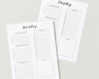 May include: Two white daily planner sheets with black text. One sheet is labeled "Monday" and the other "Tuesday". Each sheet has sections for high and normal priority tasks, a schedule, and notes. The sheets are on a light gray background.