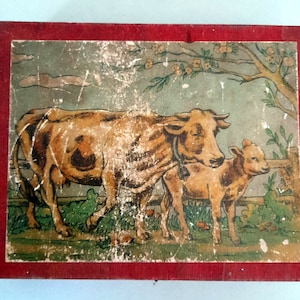 Caja de juguete de rompecabezas de animales de cubos de bloques de madera para niños alemanes antiguos de 1900