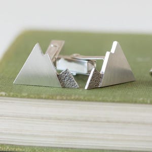 Silver Mountain Cuff links ideal gifts for men. Cufflinks are inspired by nature and climbing and hill walking