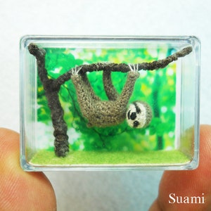 May include: A black card with a pink tower, yellow flowers, and a brown bear wearing a striped scarf. The text "berkeley" is written in white cursive on the card.