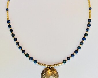 handmade solid brass Evil Eye amulet pendant on beaded necklace