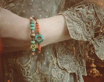 Pair of two hand-beaded colorful boho floral bracelets