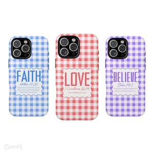 May include: Three phone cases with gingham patterns in blue, red, and purple. Each case features a different word: "FAITH", "LOVE", and "BELIEVE", along with related Bible verses. The cases are designed to fit a smartphone.