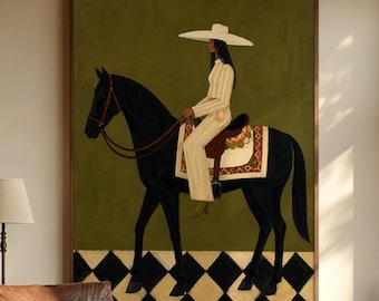 May include: A framed wall art print featuring a person in a white suit and wide-brimmed hat riding a black horse. The background is olive green with a black and white diamond pattern at the bottom. The artwork is displayed in a living room setting.