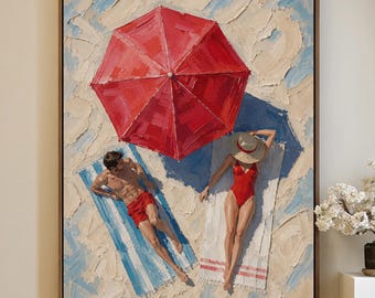 May include: Oil painting of a beach scene with a red umbrella casting a shadow over two figures in swimwear. One figure is wearing red swim trunks and the other is wearing a red swimsuit. The painting is framed in a brown wooden frame.
