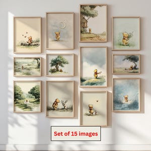 May include: A set of 15 framed art prints featuring watercolor illustrations of a bear in various scenes. The artwork includes images of the bear with a moon, in a treehouse, and with a rabbit. The text "Set of 15 images" is visible.