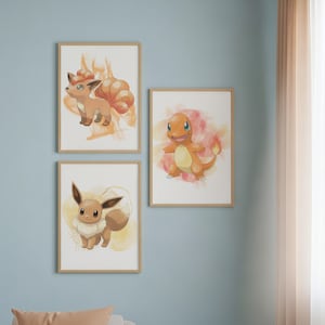 May include: Three framed watercolor prints featuring popular cartoon characters. The top print shows a fox-like creature with orange and brown fur. The middle print depicts an orange lizard-like character. The bottom print shows a brown and white creature with large ears.