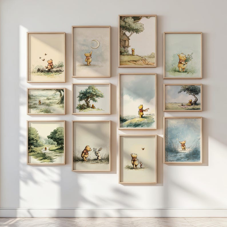 May include: A collection of framed watercolor art prints featuring Winnie the Pooh in various scenes. The artwork includes images of Pooh with friends, under trees, and in nature, with soft colors and a whimsical style.