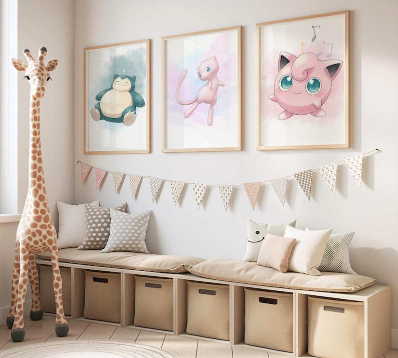 May include: Three framed watercolor prints of Pok&eacute;mon characters, including Snorlax, Mew, and Jigglypuff, hang above a built-in bench with storage cubes. A giraffe toy stands to the left, and a banner of pennants decorates the wall.