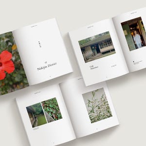Minimalist travel photo book template in Canva featuring an Okinawa beach layout, DIY coffee table book design with modern editorial style and clean aesthetic pages, evoke layout studio