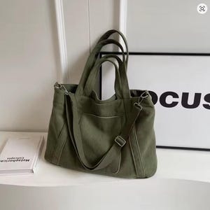 Women’s everyday corduroy tote bag with custom name, shown as a spacious casual handbag sized to fit notebooks; features shoulder or crossbody straps and works as a new mom’s essential items holder for kids’ and baby necessities.