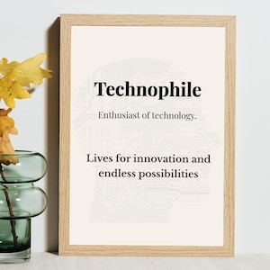 May include: A framed print with the word "Technophile" in a bold, black font. The definition below reads "Enthusiast of technology." and "Lives for innovation and endless possibilities." A circuit board design is in the background.