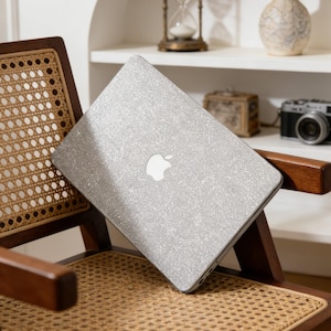 May include: A rustic wooden sign with the text "Welcome to our home" in white lettering. The sign features a distressed finish and a simple, inviting design, perfect for entryway decor.