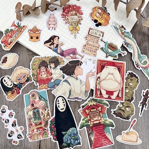 May include: A collection of colorful anime-style stickers featuring characters and scenes. The stickers depict various figures, including a dragon, a frog, and a character in a black cloak. Other stickers show food and floral arrangements.