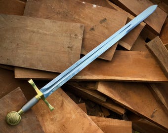 Réplica de la espada Excalibur forjada a mano: pieza coleccionable del Rey Arturo con funda de cuero.