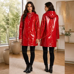 May include: A bright red, glossy, water-resistant raincoat featuring a hood with adjustable drawstrings, a front button-down closure with silver-toned hardware, long sleeves, and a mid-thigh length hem, shown from both the front and back views.