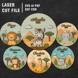 May include: Laser cut file featuring six circular wooden plaques with safari animal designs. Each plaque has a name, such as "Henry" and "Amelia", and a corresponding animal illustration, including a lion, zebra, and elephant. The text "LASER CUT FILE" is at the top.