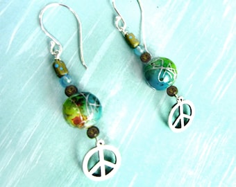 Earth Day earrings called "Peaceful Planet" with peace sign charms & "planet" beads, silver "jet path" lines / globe jewelry