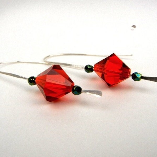 Red crystal earrings with emerald green Czech glass beads on sterling silver hammered wire