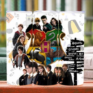 May include: A white tumbler featuring a collage of characters and symbols from the Harry Potter series. The design includes the Hogwarts crest, character portraits, and location signs like Hogwarts and Diagon Alley.