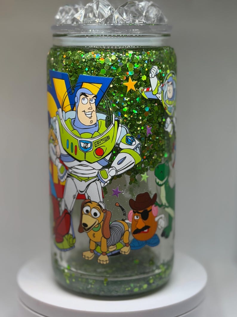 Toy Story Snow Globe Tumbler | 16oz Glass Can Cup | Buzz Lightyear & Woody Glitter Cup | Toy Story Lover Gift | Kids Character Tumbler image 1