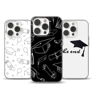 May include: Three phone cases with graduation-themed designs. One case has a white background with black line drawings of graduation caps, diplomas, balloons, and stars. The second case has a black background with white line drawings of graduation elements. The third case is white with a black graduation cap and the words "the end".