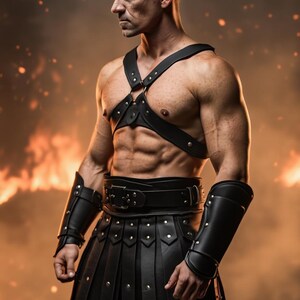 May include: A muscular figure in black leather armor, including a chest harness, belt, arm cuffs, and a pleated skirt. The armor is studded with silver rivets. The background features a fiery, orange glow.