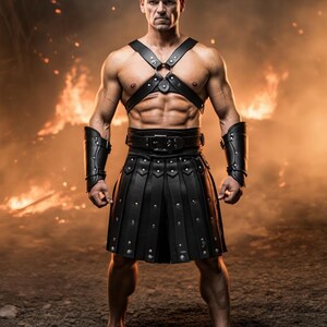 May include: A muscular figure in black leather armor, including a harness, arm cuffs, and a pleated kilt. The armor is studded with silver rivets. The background features a fiery, orange glow, suggesting a battle or fantasy theme.