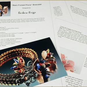 May include: A close-up of a colourful beaded bracelet with a metal clasp and toggle. The bracelet is made with seed beads in shades of brown, green, and copper. The instructions for making the bracelet are visible in the background.