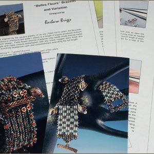 May include: Two beaded bracelets, one with red and brown beads and the other with blue and white beads, are displayed on a black surface. The bracelets are made with a combination of beads and metal components. The image includes text that reads "Belles Fleurs" Bracelet and Variation, Designed by Barbara Briggs.