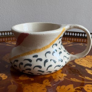Vintage hand thrown and hand painted small unique studio pottery mug/colourful